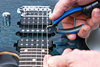 Bild på MusicNomad MN223 - Grip One All-in-One
